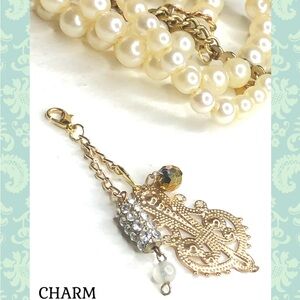 Elegant Gold and Silver Charm Necklace